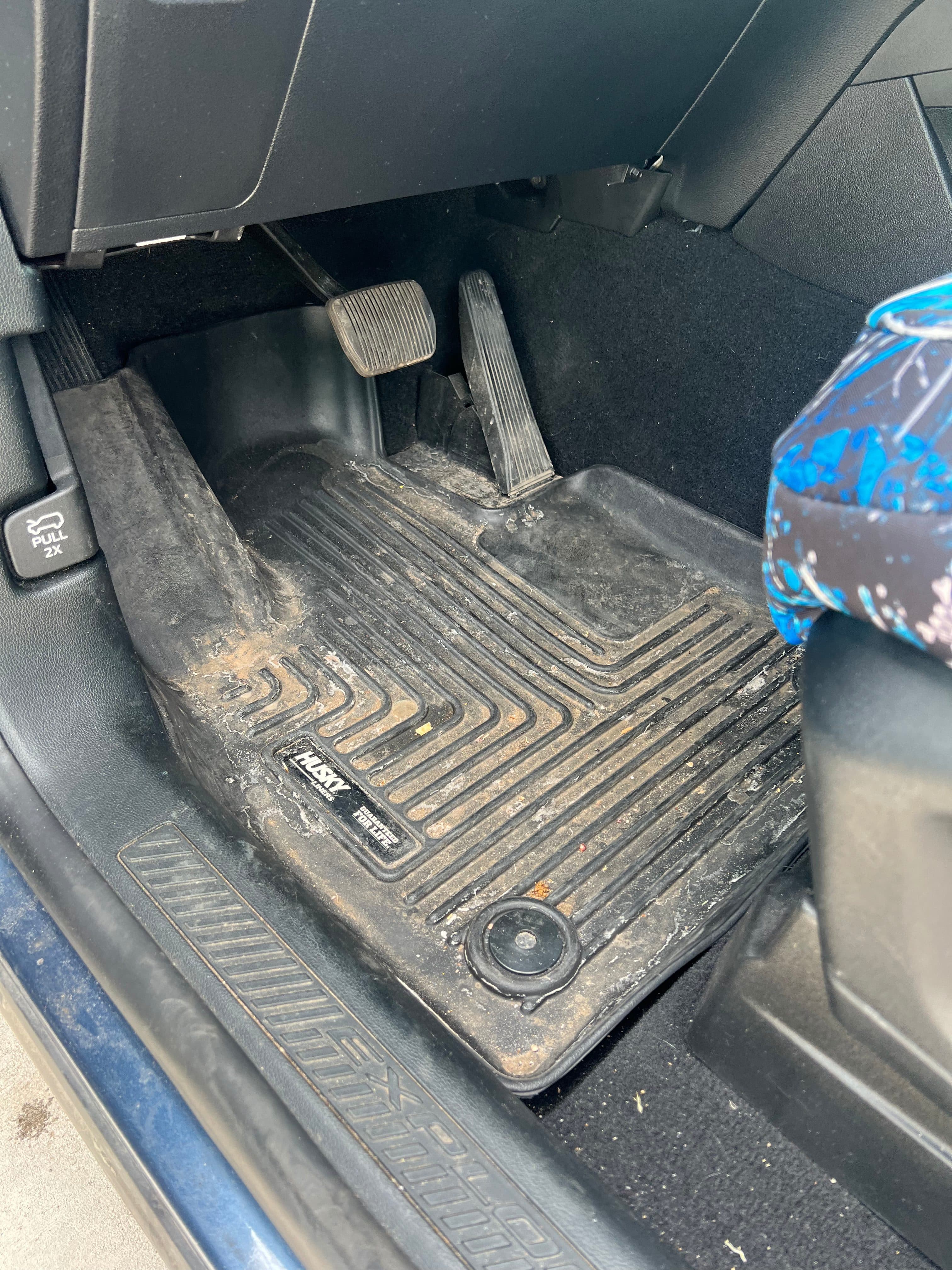 After detailing - pristine clean car floor mats restored by Bousquet's Auto Spa